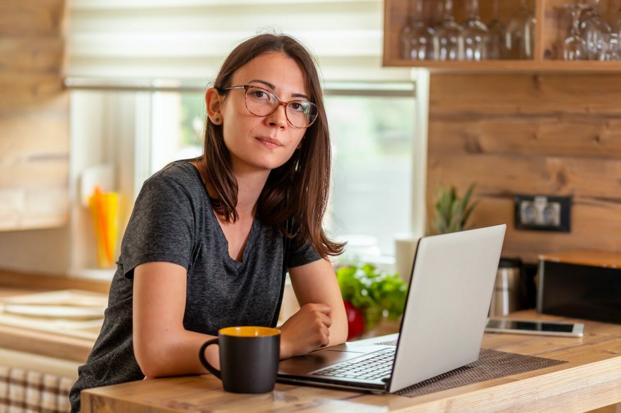 female web designer working in home office